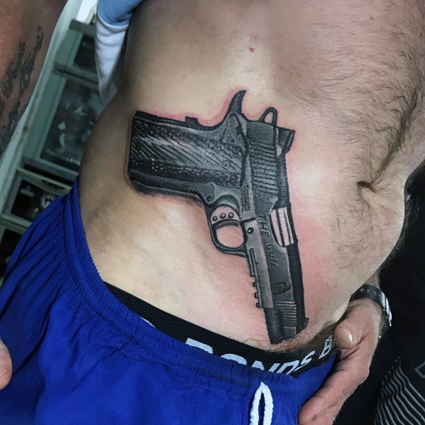 Pornstar with gun tattoo