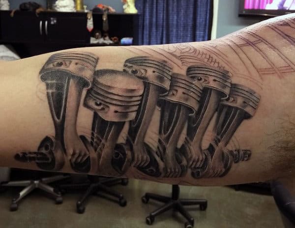 bicep car tattoo designs for men with pistons