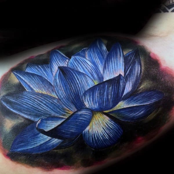 blue lotus flower male inner arm tattoo inspiration
