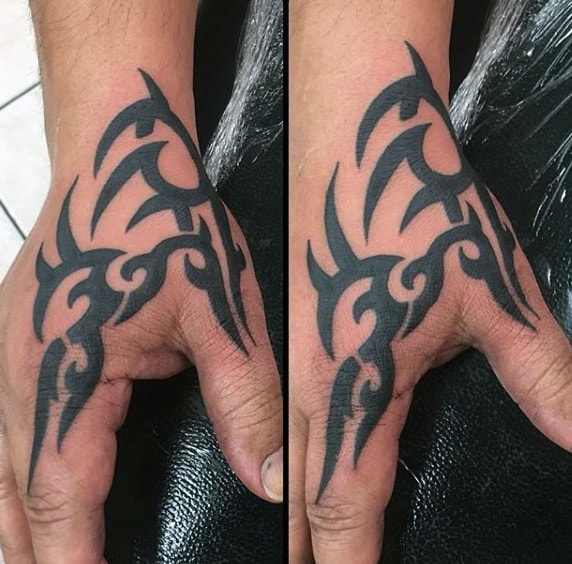 40 Tribal Hand Tattoos For Men  Manly Ink Design Ideas