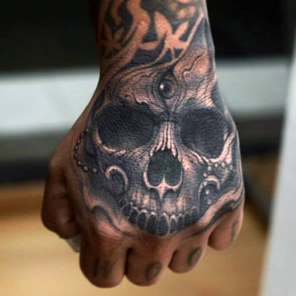 80 Skull Hand Tattoo Designs For Men Manly Ink Ideas