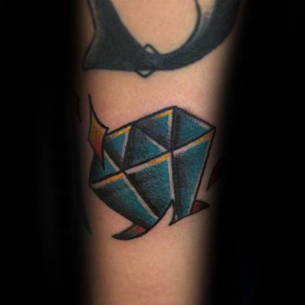 Gentleman With Blue Sparkling Diamond Traditional Forearm Tattoo