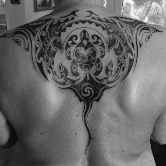 Gentleman With Stingray Tribal Tattoo On Back With Black Ink