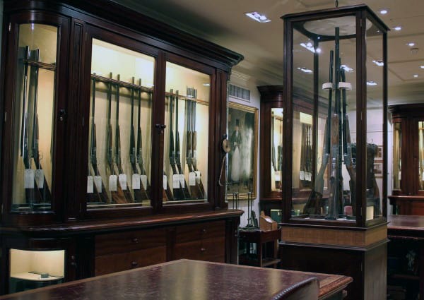 Glass Encased Collectors Firearms In Gun Room