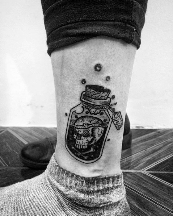 Guy With Lower Leg Black Ink Poison Bottle Tattoo Design