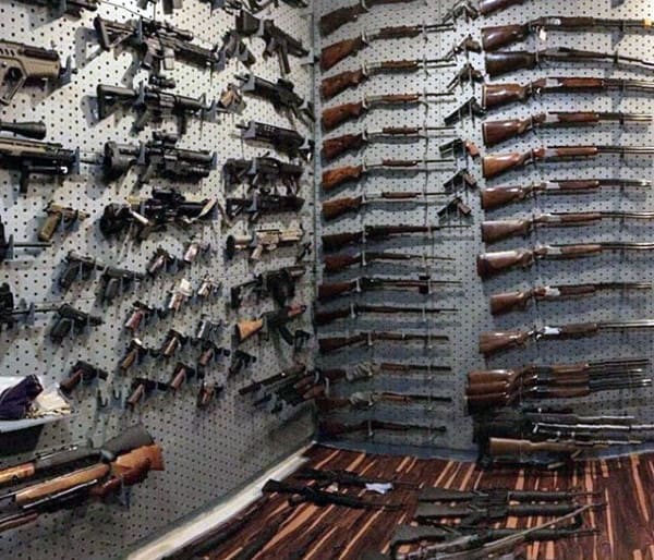 Hardwood Floors In Gun Room With Grey Wall Racks