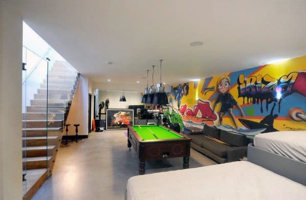 Home Basement Man Cave With Graffiti Walls And Lounge