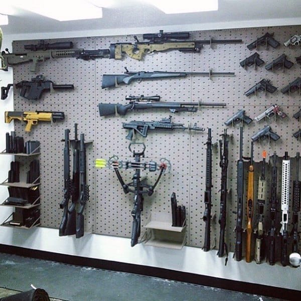 Hunters Wall Of Firearms In Gun Room