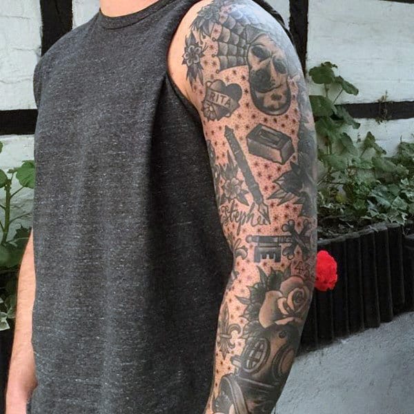 Male With Tattoo Of Traditional Sleeve Design
