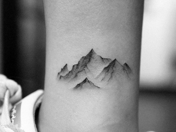 minimalist mountain tattoo back