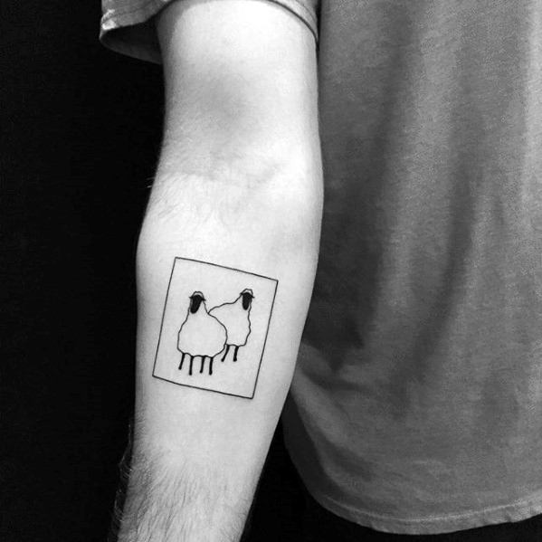 Tiny minimalist sheep tattoo on the inner forearm. Sheep