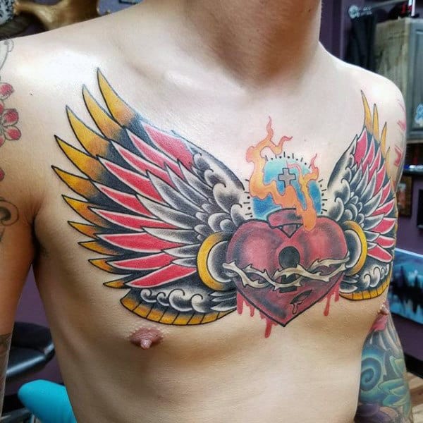 40 Wing Chest Tattoo Designs For Men - Freedom Ink Ideas