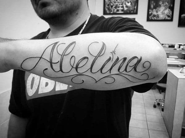 4. Small name tattoos on forearm - wide 5