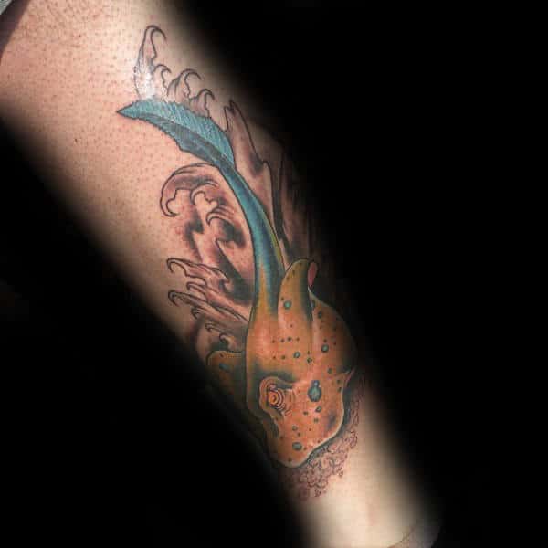 Stingray Making Splash In Water Waves Male Arm Tattoo
