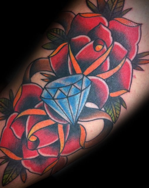 Traditional Rose Flowers With Blue Diamond Mens Inner Arm Bicep Tattoo