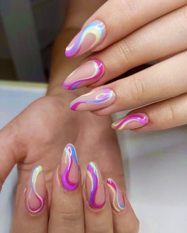 Nude nails with pastel rainbow swirls