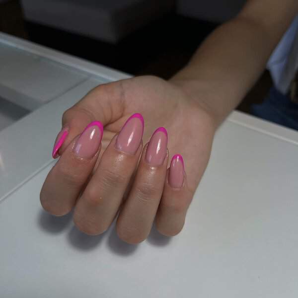 Nude nails with hot pink tips