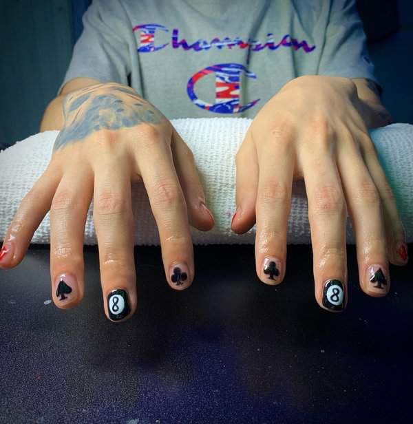 Eight ball and club nail design