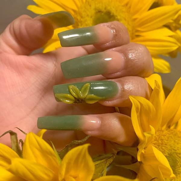 Green nails with sunflower art