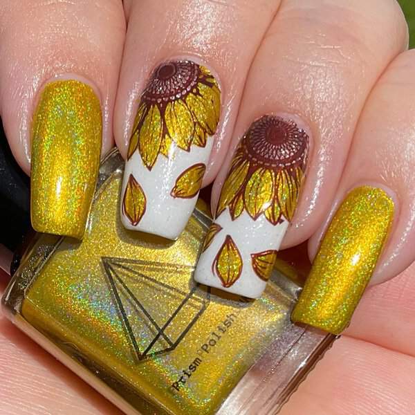 Yellow glitter nails with sunflower design