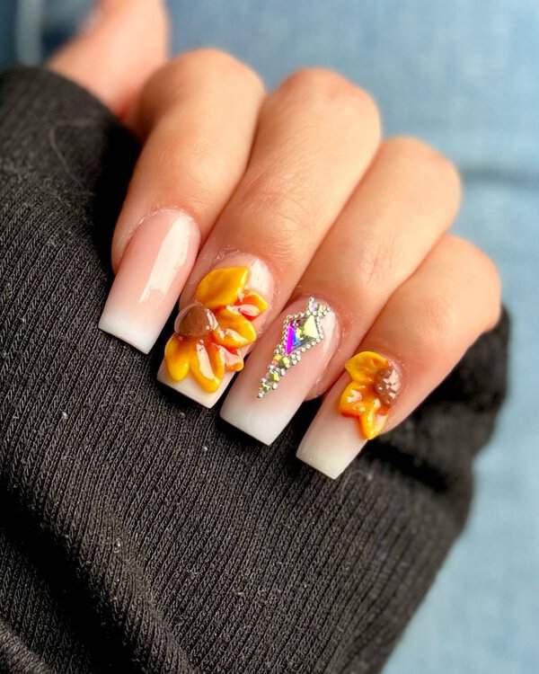 3D sunflower nails with rhinestones