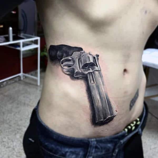 Discover more than 70 gun tattoos for men  thtantai2