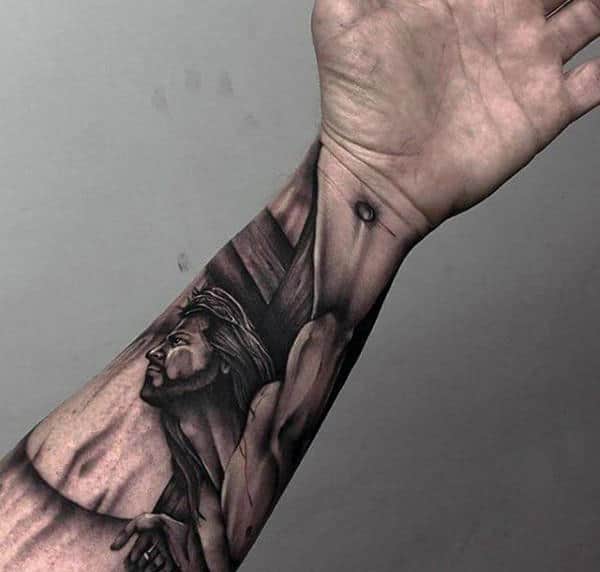 3d Jesus On Cross Mens Wrist And Forearm Tattoo