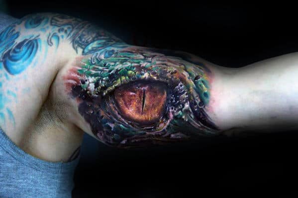 3d-realistic-dragon-eye-inner-arm-bicep-tattoo-on-male