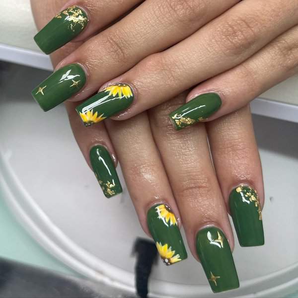Green nails with sunflowers and golden details