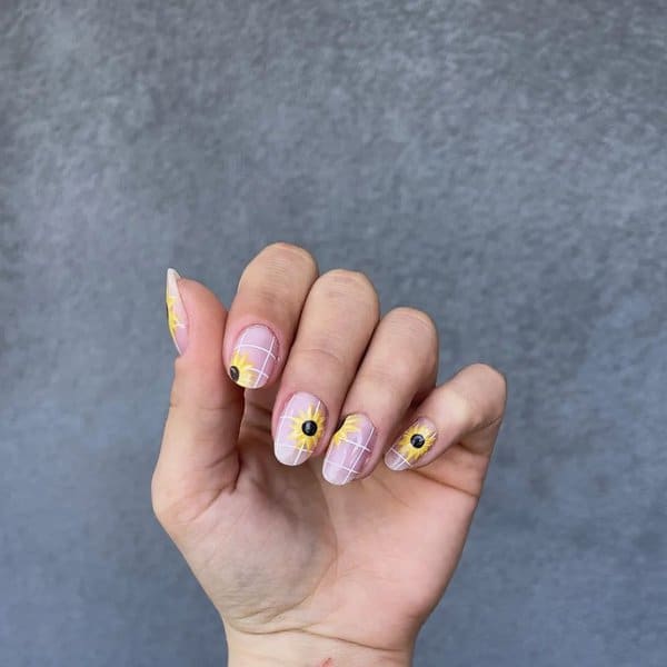 Plaid nails with sunflower details