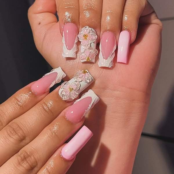 Pink nails with 3D floral designs