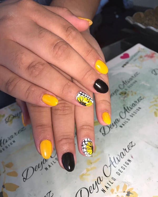 Yellow, black, sunflower nail designs
