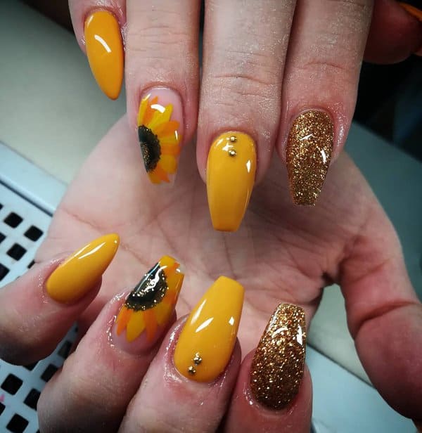 Yellow and glitter acrylic nails