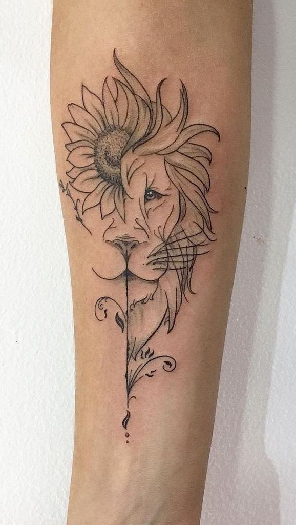 large black and grey line tattoo on forearm of a lion face split down the middle with a sunflower