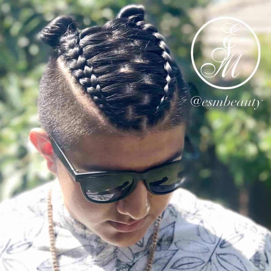 A Man Bun Style Paired With Two Thick Braids. Braids Are Ideal For Man Bun Styles
