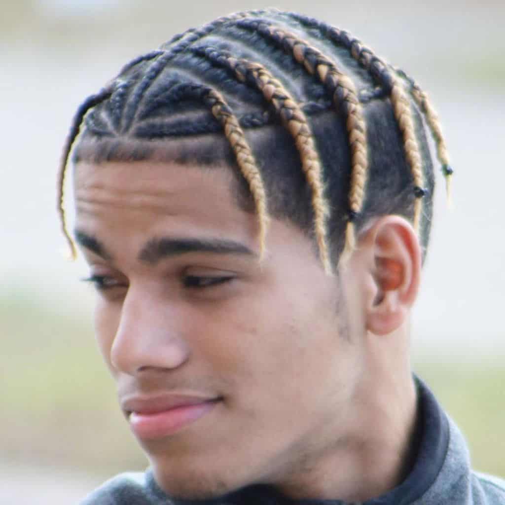 A Man Wearing Blonde Cornrows. Colors Are A Great Way To Spice Up Cornrows