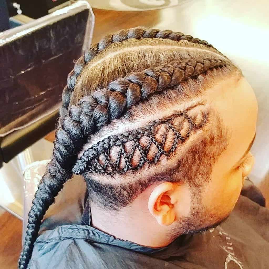 A Men’s Classic Cornrows Hairstyle With Thick Braids Flowing From The Hairline To The Back And Paired With Thin Crisscross Cornrows On The Sides