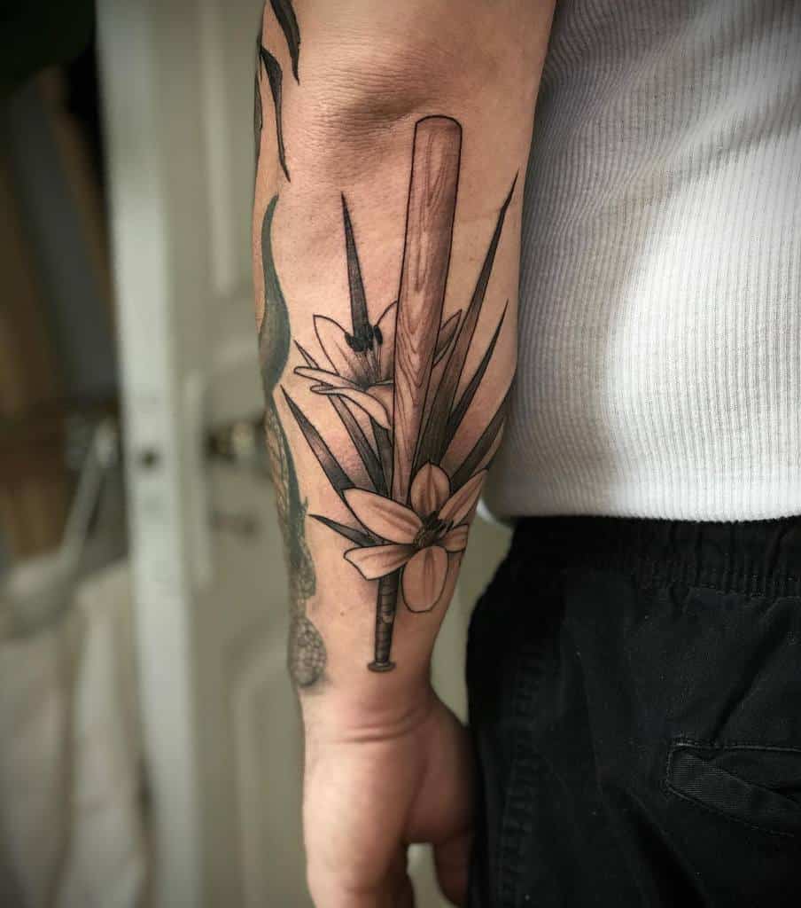 Lily flower tattoo for guys
