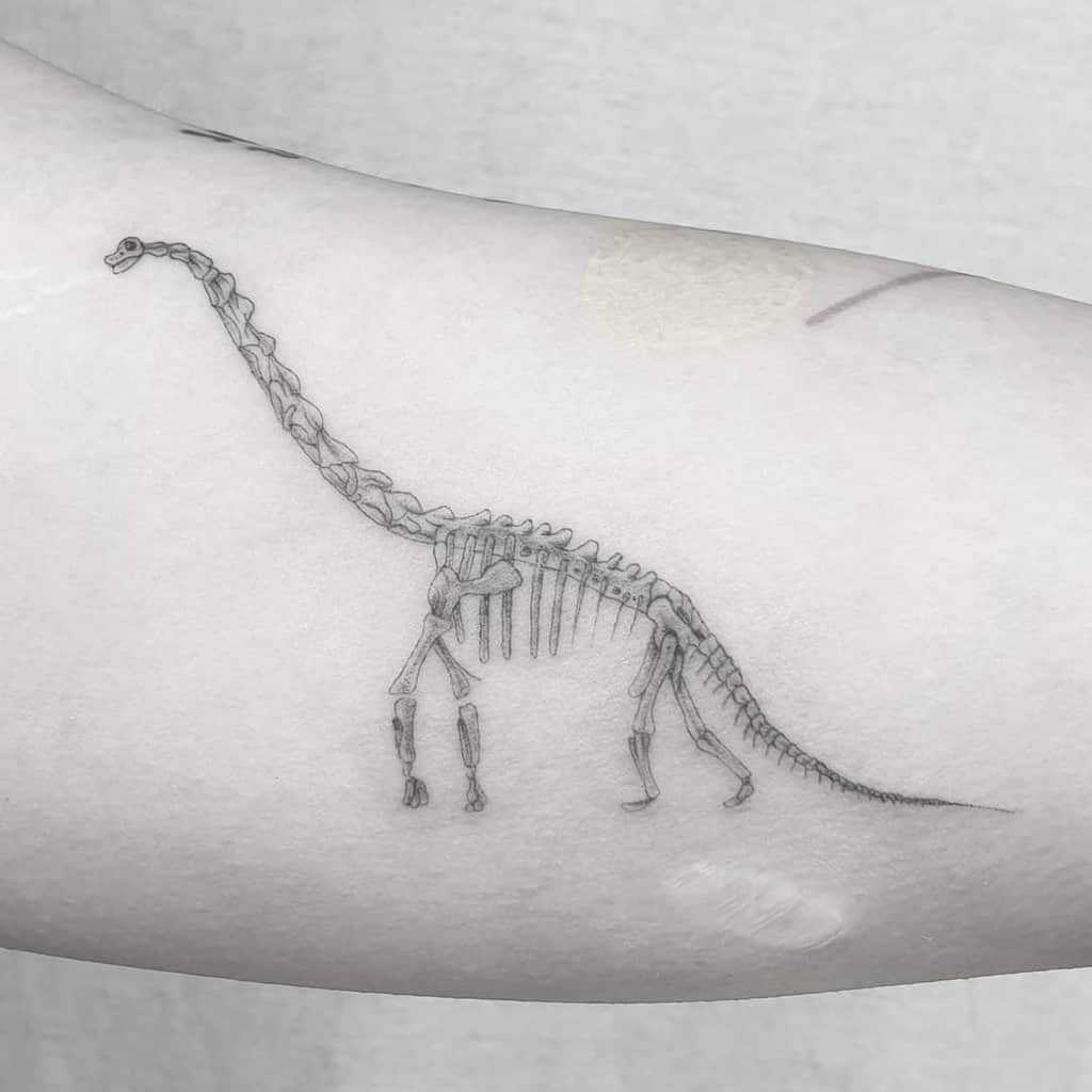 black-work-micro-realism-ankle-dinosaur-single-needle-tattoo-danielnijveld_com