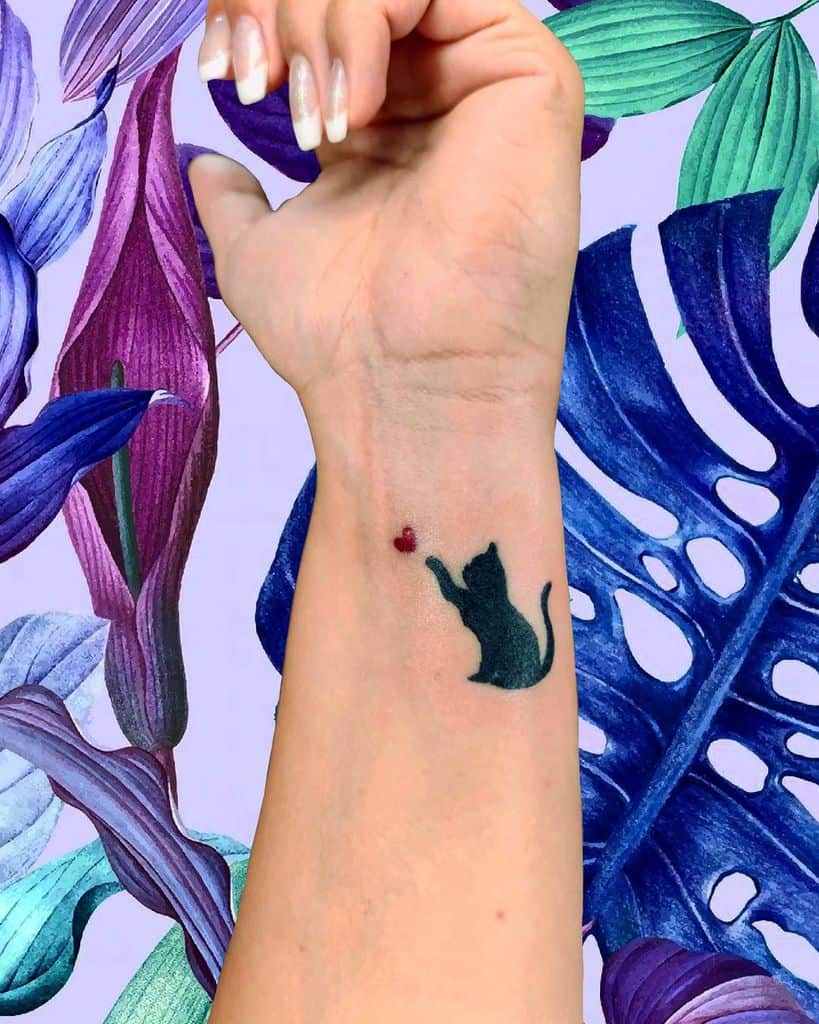 Black Cat Wrist Tattoo rikku_tattoo