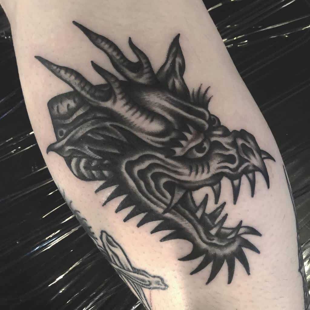 Black Dragon Head Tattoo left_lung