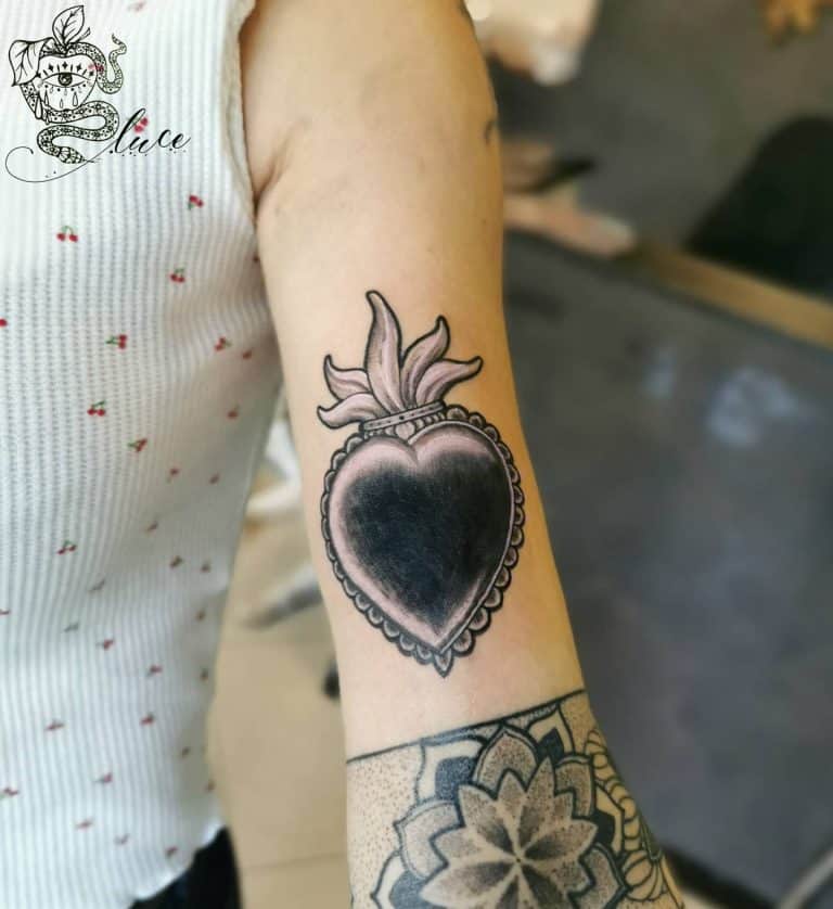 Black Heart Tattoo on Women