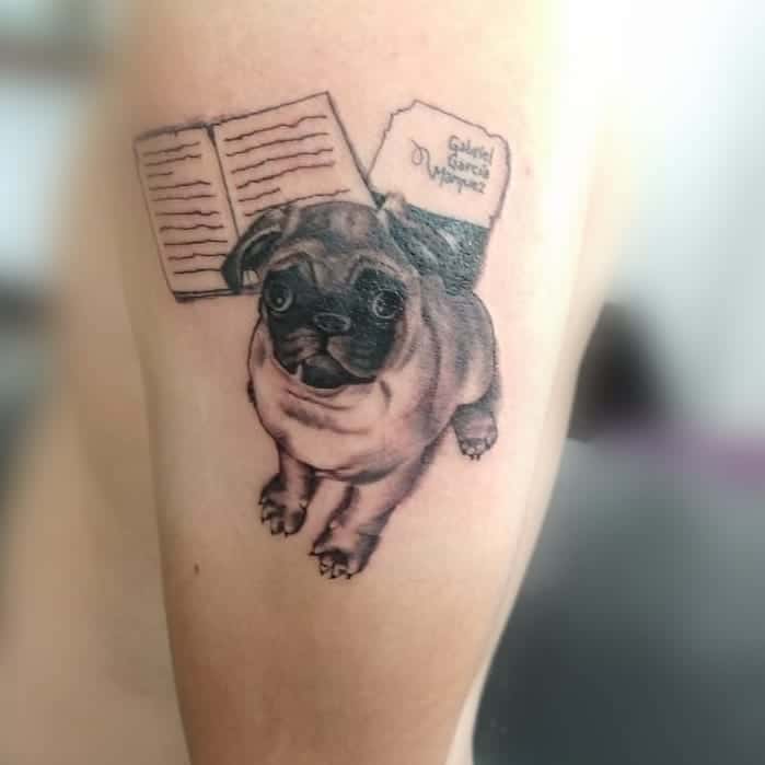 Microrealistic pug tattoo on the tricep