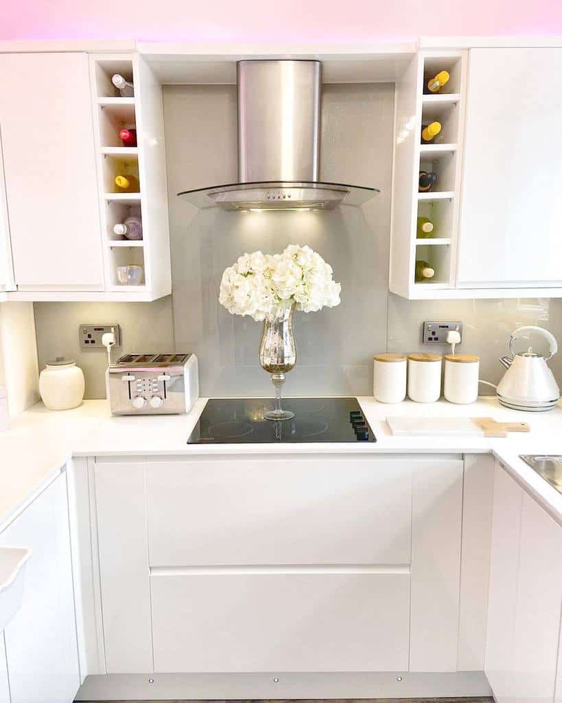 white kitchen cabinets wine holder pink led lights 