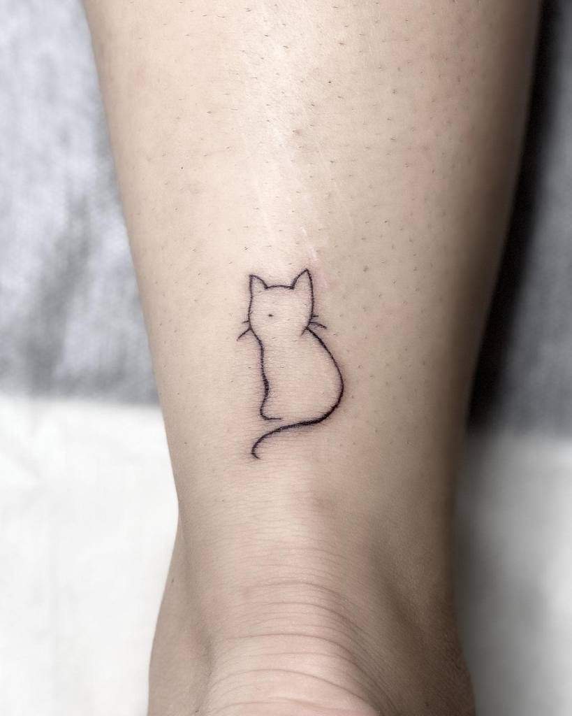 Cat Outline Ankle Tattoo nikastattooartistry