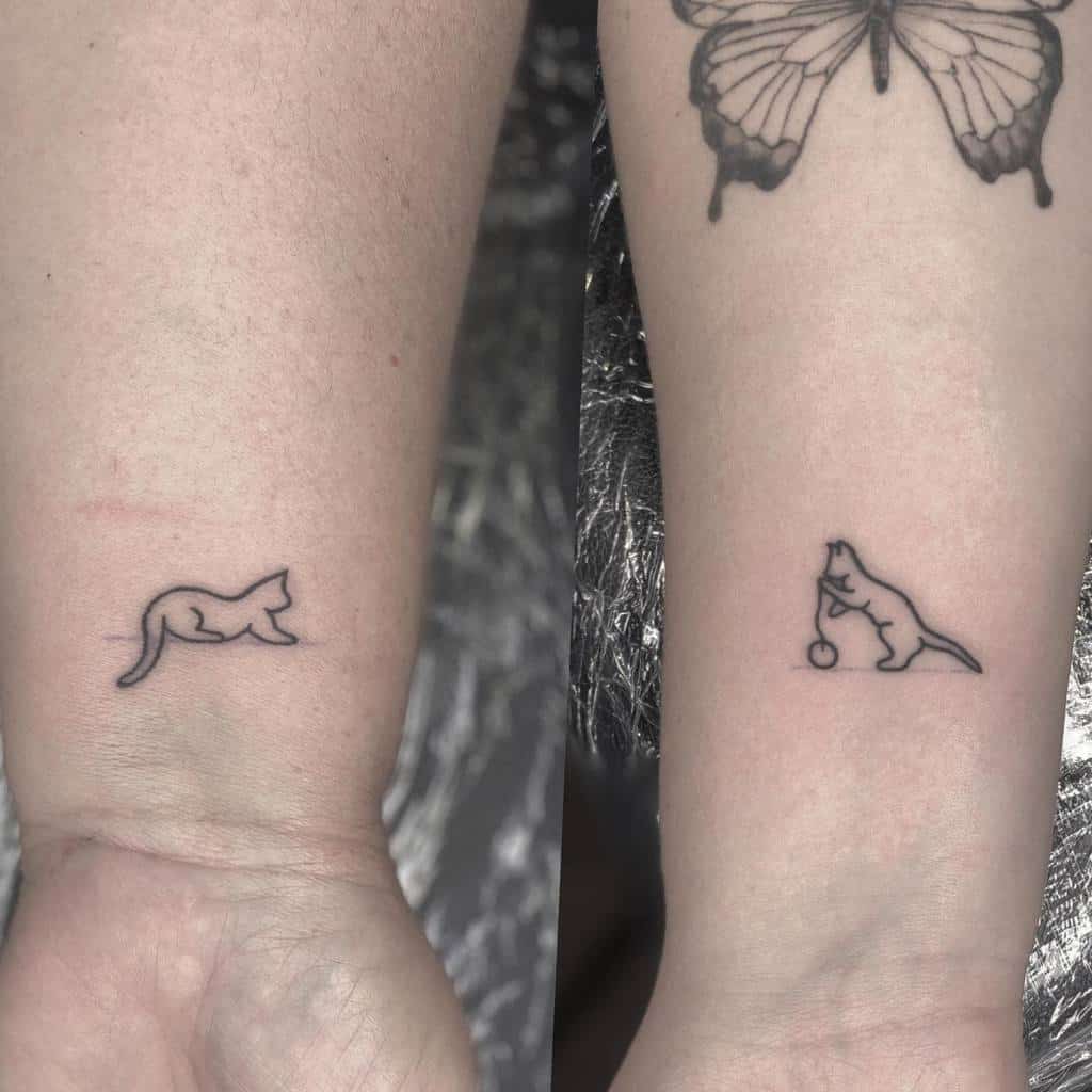 Cat Outline Wrist Tattoo reddesertink
