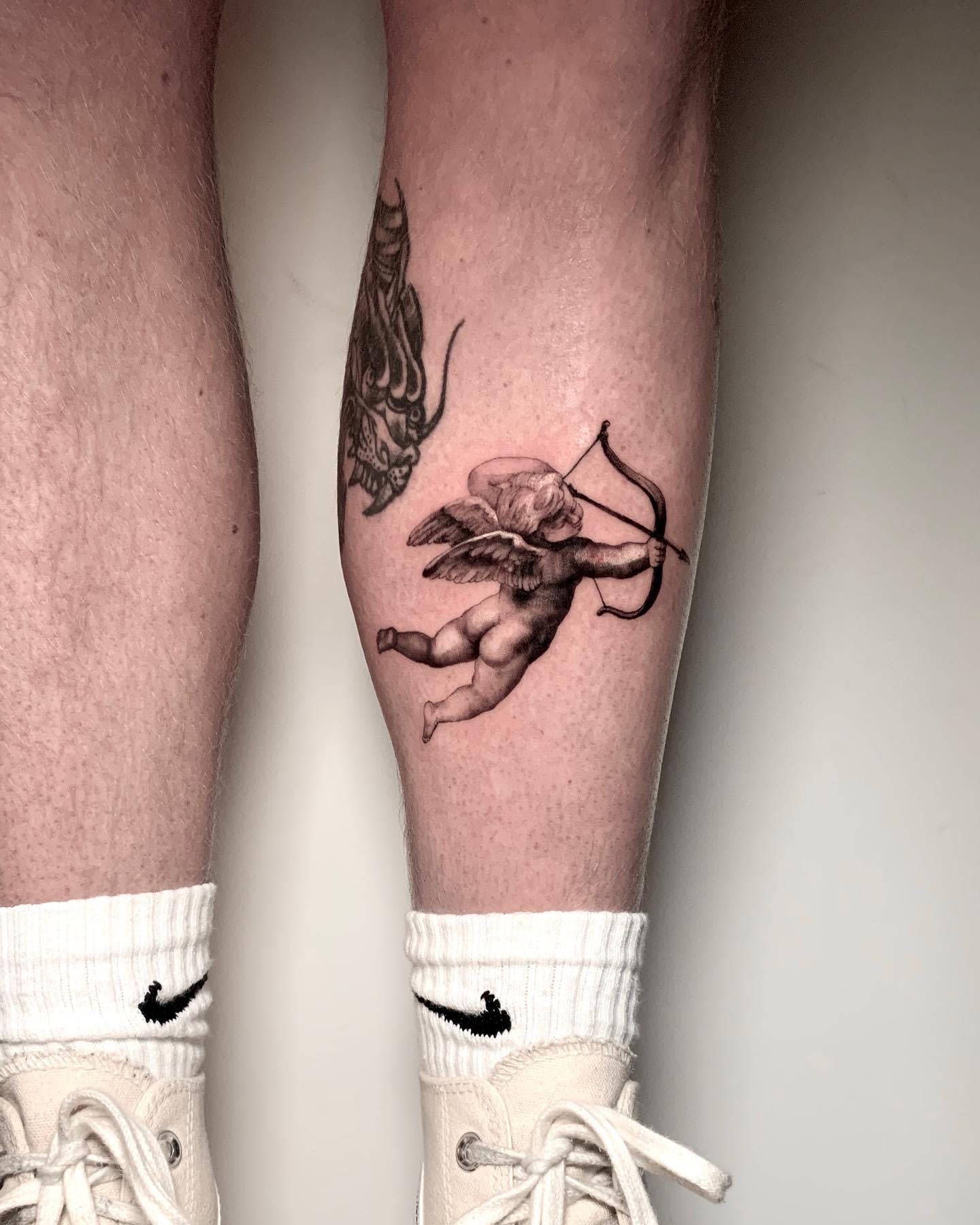 Devil Cupid | Cupid tattoo, Devil tattoo, Evil tattoos