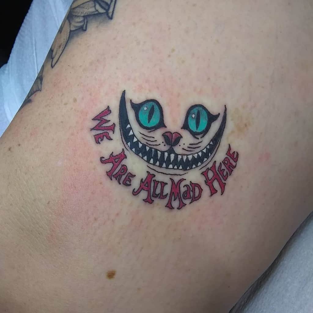 Cheshire Cat Smile Tattoo quinntattooz