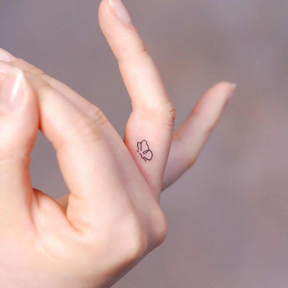 Cool Small Finger Tattoos wittybutton_tattoo
