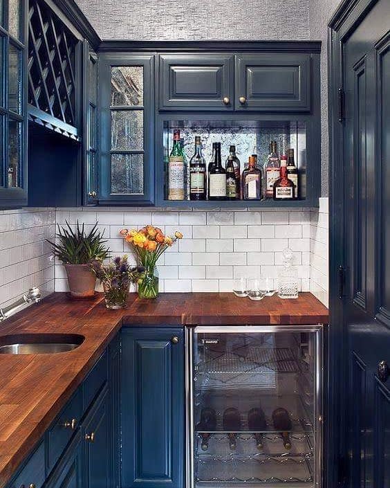 wood countertop blue butler's pantry spirits storage 